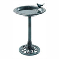 A dark green cast iron pedestal birdbath with a decorative bird perched on the rim, shown against a plain white background.